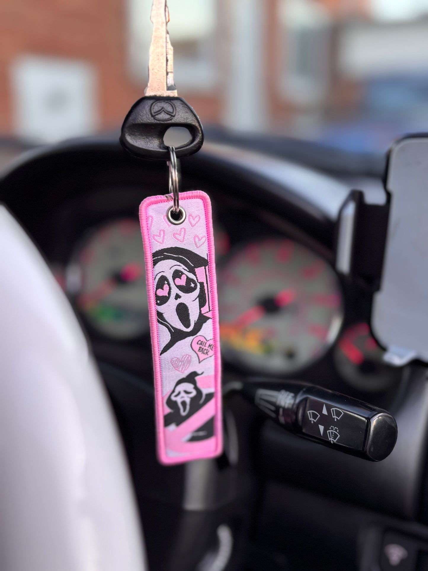 PINK GHOST FACE JET TAG